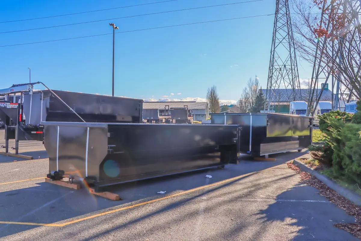 Roll-off dumpster ready for waste disposal at job site for Construction Dumpster Rental in Hamilton